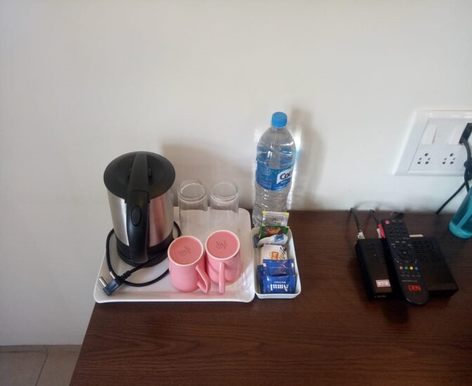 Suite with wooden furnishings at Oleander Suites Coorg